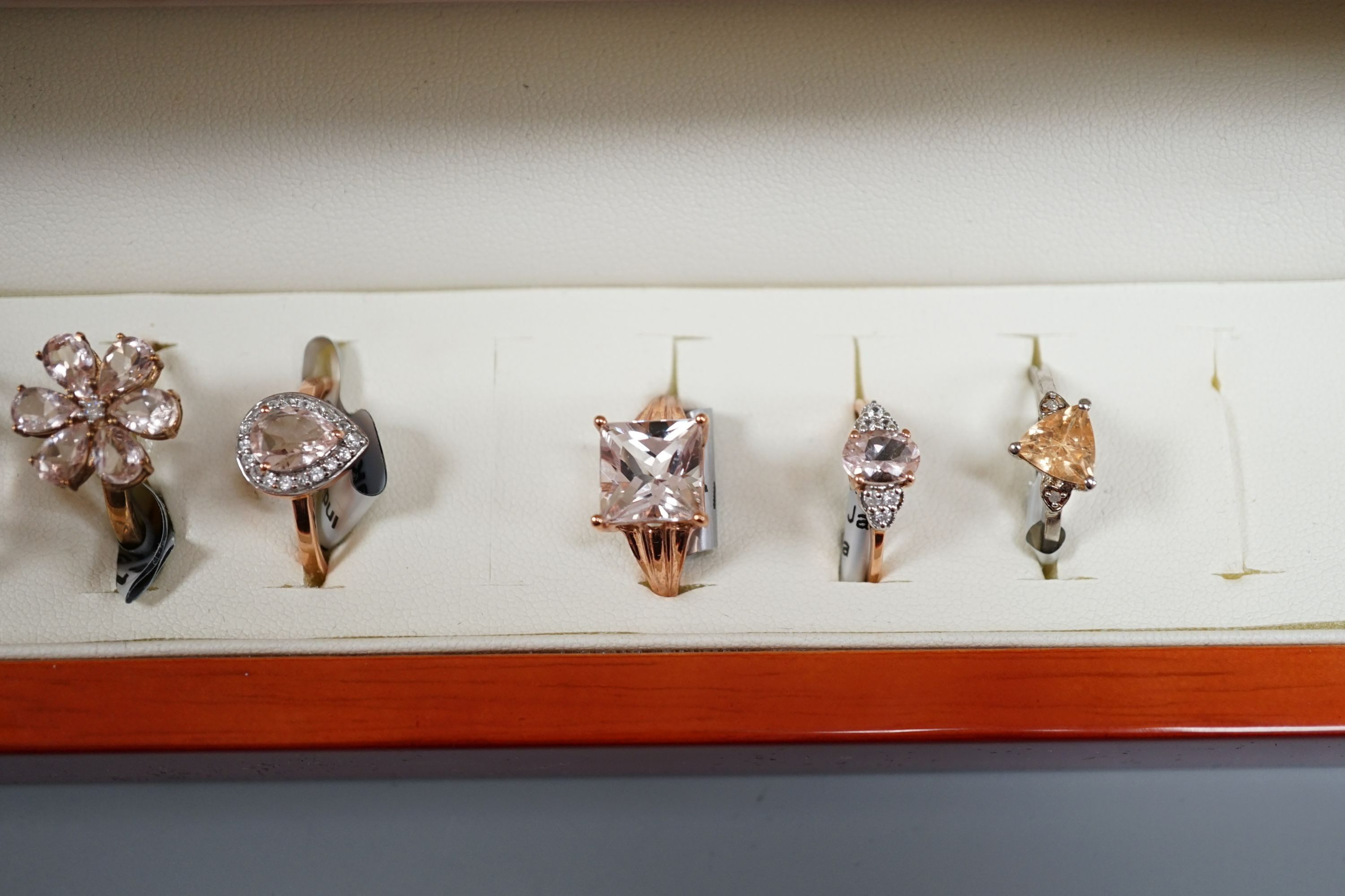 Eight assorted modern 9ct gold and morganite set dress rings and a 925 and gem set ring